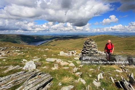 Walker At The Cairns On Artle Crag Branstree Fell Haweswater Reservoir ...