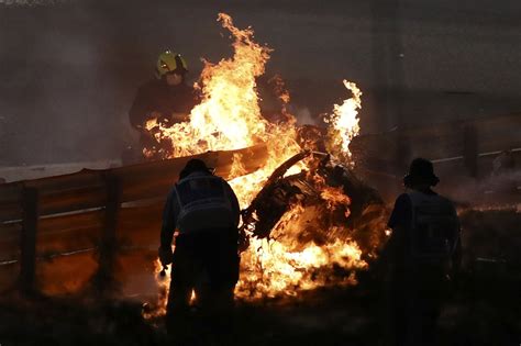 In photos: F1 driver Grosjean makes miraculous escape from fiery crash ...