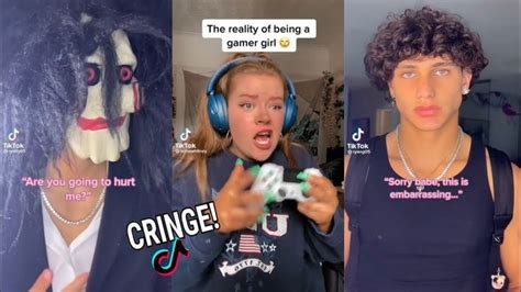 two people with headphones on and one is holding a game controller in front of her face