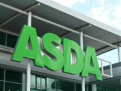 ASDA green sign logo. UK supermarket ASDA sign in the daytime against ...