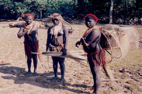 Jarawa women wearing tasselled waist ornaments called onnige ...