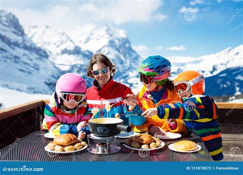 Family Apres Ski Lunch in Mountains. Skiing Fun Stock Photo - Image of holiday, family: 131878072