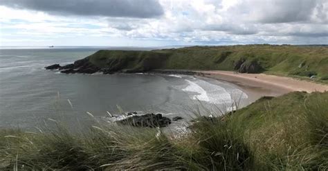 Hackley Bay and Aberdeenshire coastline looking towards Aberdeen, Buildings Stock Footage ft ...