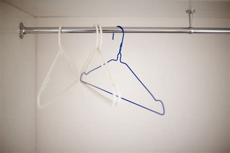 Free Image of Wire coat hangers on a clothing rail | Freebie.Photography