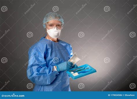 Medical Surgeon Holding Tools for Operation Stock Photo - Image of expertise, operation: 179834586