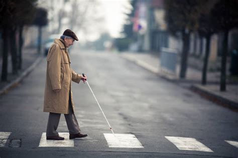 Blind Person Walking Stock Photos, Pictures & Royalty-Free Images - iStock