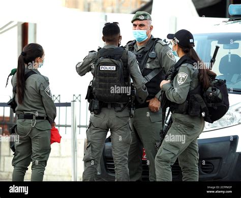 Israel Border Police Magav wearing protective face masks against COVID-19 Coronavirus. Western ...