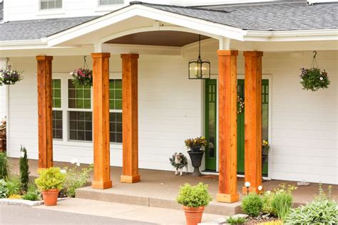 Adding Cedar Pillars to our Dream House | House front porch, Front ...