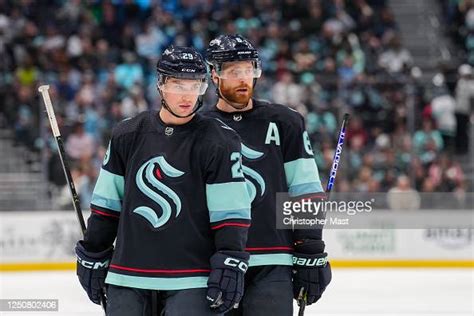 Vince Dunn and Adam Larsson of the Seattle Kraken look on during the... News Photo - Getty Images