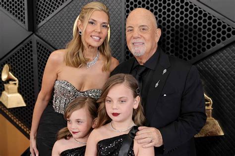 Billy Joel Poses at 2024 Grammys with Wife and Daughters: Photos