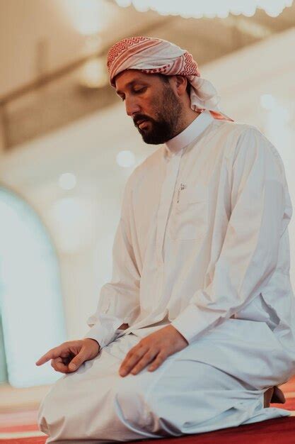 Premium Photo | A muslim praying in a modern mosque during the holy ...