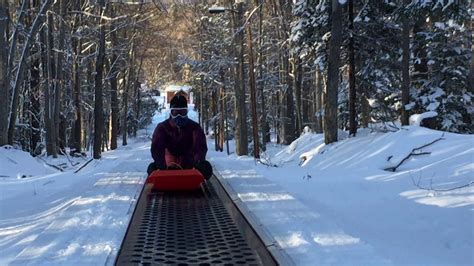 Conveyor ride at Blackwater Falls State Park sledding run on Vimeo