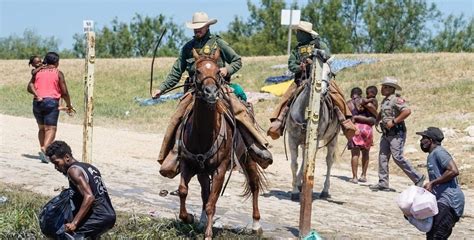 U.S. Border Patrol on horseback seen whipping Haitian migrants