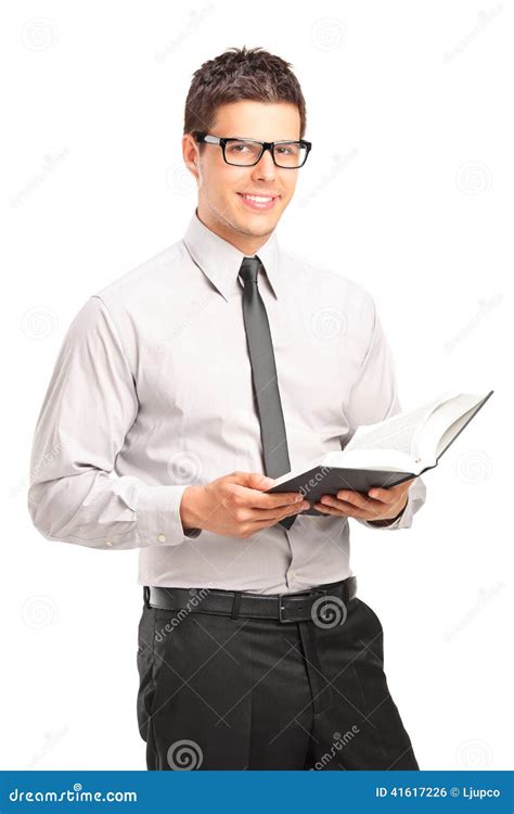 Handsome Young Man Holding A Book Stock Photo - Image: 41617226