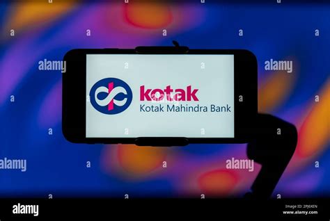 In this photo illustration, the Kotak Mahindra Bank logo is seen ...