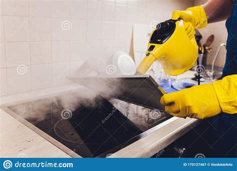 Professional Janitor Cleaning Mesh Filter of Cooker Hood in Kitchen, Closeup. Stock Image ...