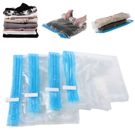 Manually Vacuum Compressed Bag Roll Up Seal Bags Travel Space Saver Storage Bags Clothes ...