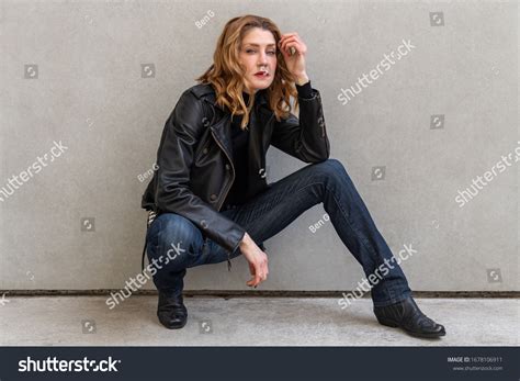 Woman Poses Crouched Down Front Blank Stock Photo 1678106911 | Shutterstock