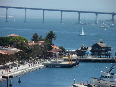 Seaport Village with the Coronado Bridge in the background. | San diego vacation, Coronado ...