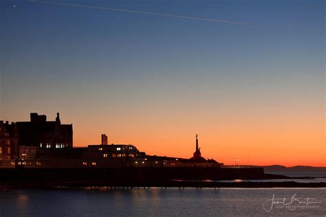 Janet Baxter Photography | Aberystwyth pier & beach at night