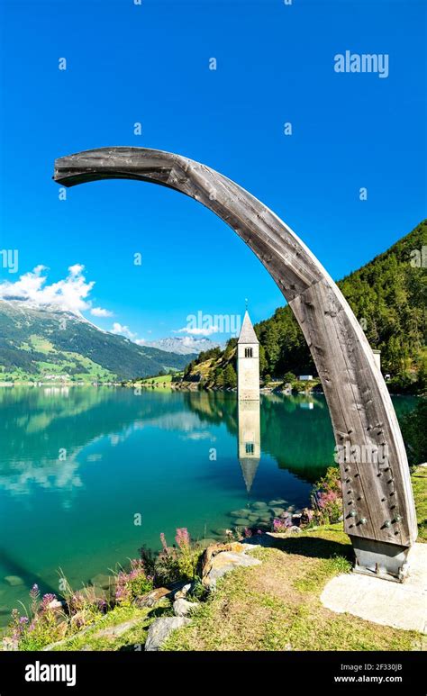 Submerged Bell Tower of Curon on Lake Reschen in South Tyrol, Italy Stock Photo - Alamy