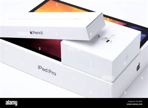 Apple pencil, AirPods Pro, iPad Pro boxes isolated on the white background, December 2020, San ...