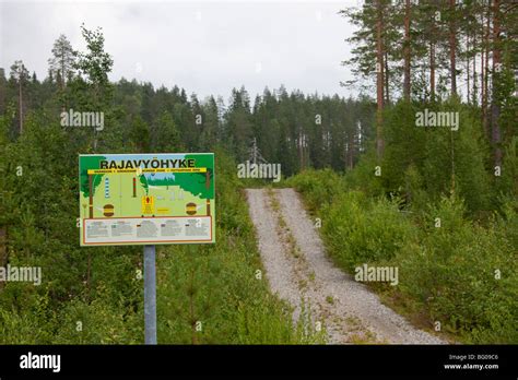 Boundary sign between the borders of Finland and Russia in Karelia Stock Photo - Alamy