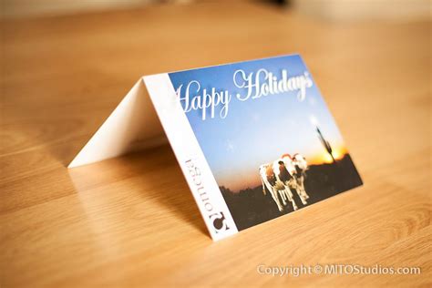 a greeting card sitting on top of a wooden table