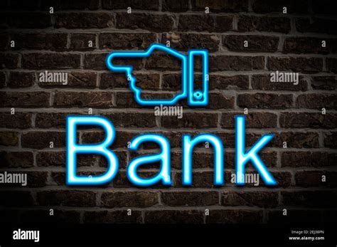 Detail photo of a neon sign on a wall with the inscription Bank Stock Photo - Alamy