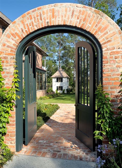 Contemporary Rustic Entryway by Ken Tate Architect | Front courtyard, Garden gates, Brick archway