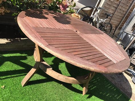 LARGE ROUND WOODEN GARDEN TABLE in E7 London Borough of Newham for £55.00 for sale | Shpock