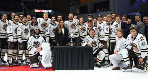 Hershey Bears take team photo near Canning Trophy, but opt not to touch it