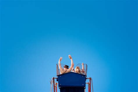 Couple Riding a Ferris Wheel Together · Free Stock Photo