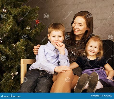 Happy Family at Christmas Tree Stock Photo - Image of santas, tradition ...