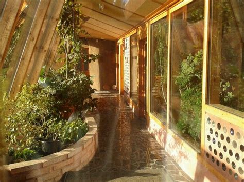 Inside the conservatory at the Brighton Earthship Earthship Plans ...