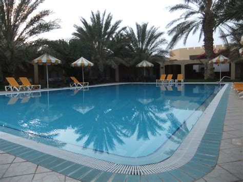 Swimming Pool | A Swimming pool with palm trees reflected in… | Flickr