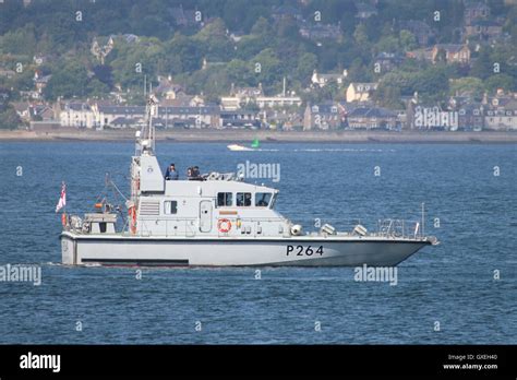 HMS Archer (P264), an Archer-class patrol vessel of the Royal Navy, off Greenock during the ...