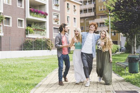 Friends walking in park stock photo