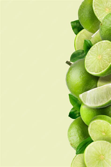 Premium Photo | Lime fruit and Lime slices on green pattern background