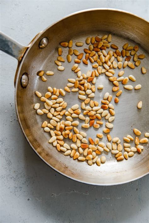 How to Toast Pine Nuts (Oven and Dry Skillet Method) - A Beautiful Plate