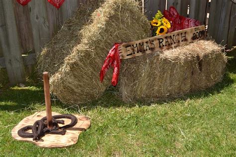 a hay bale with a sign that says elm's ranch on it