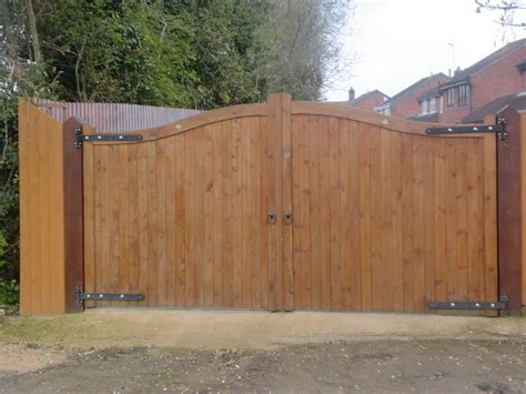 Wooden security gates | Wooden gate designs, Wooden gates, Gate design