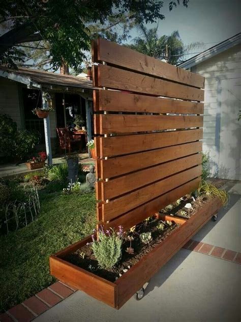 Moveable privacy fence/succulent garden made from a rolling garment rack | Privacy fence designs ...