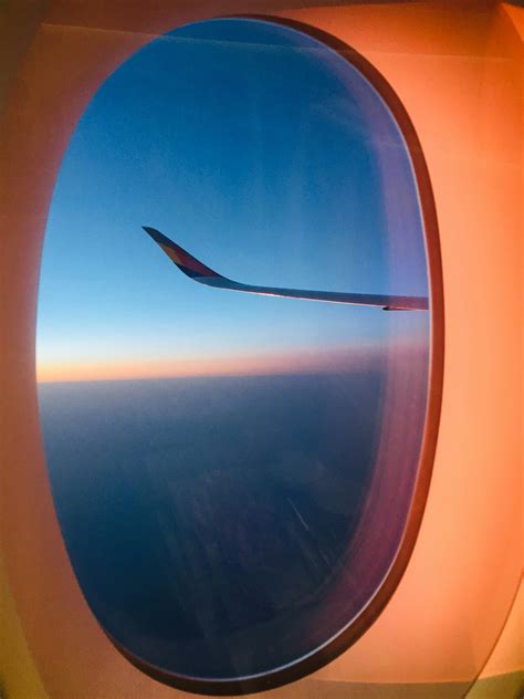 Airplane Window View of Sky · Free Stock Photo