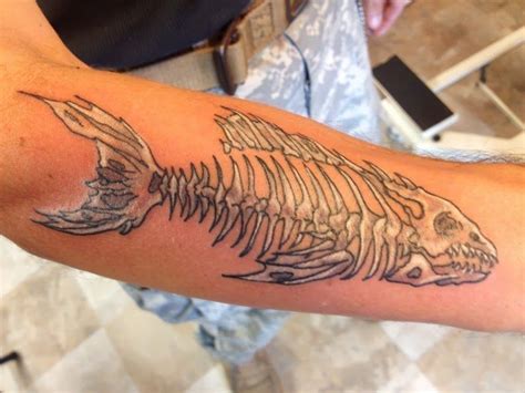 fish-bones-tattoo-on-forearm-4.jpg (793×595) | Fish bone tattoo, Bone tattoos, Small tattoos