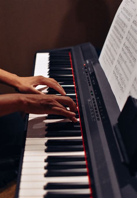 Person Playing An Electric Organ · Free Stock Photo