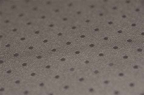 Free Image of Close up Brown Background with Dots Pattern | Freebie.Photography