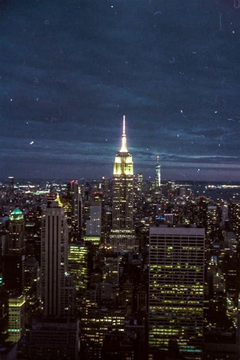 Aerial View of City Buildings during Night Time · Free Stock Photo