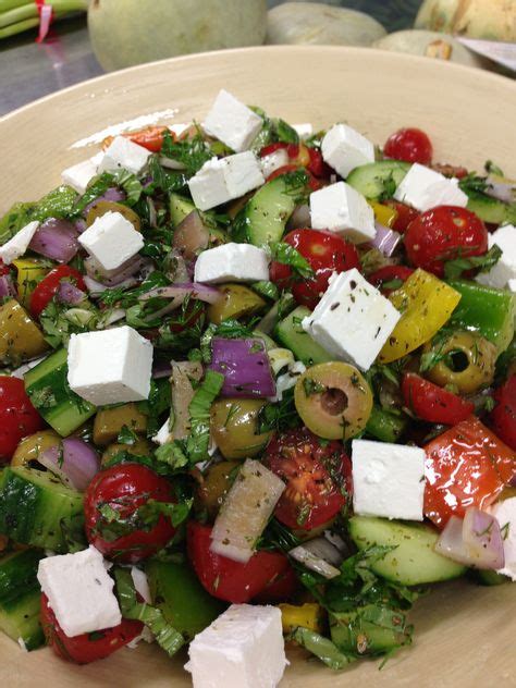 Greek salad - feta cheese, green olives, cherry tomatoes, dried oregano ...