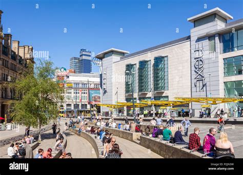 England Manchester England Manchester City centre city center shoppers outside Next store ...